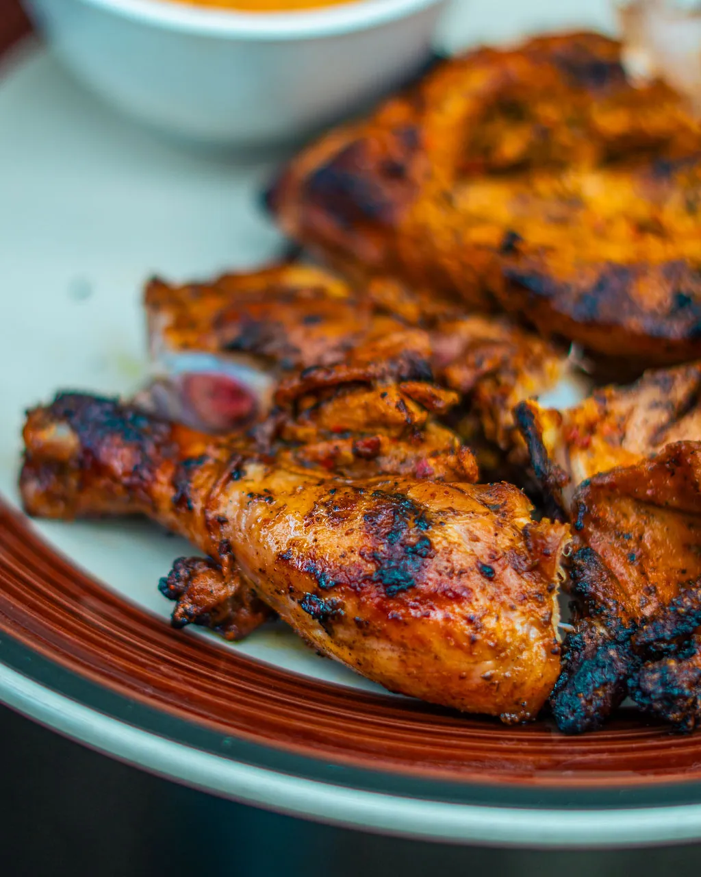 Chooza chicken — grilled chicken glazed and charred to perfection at Kaka's Barbecue
