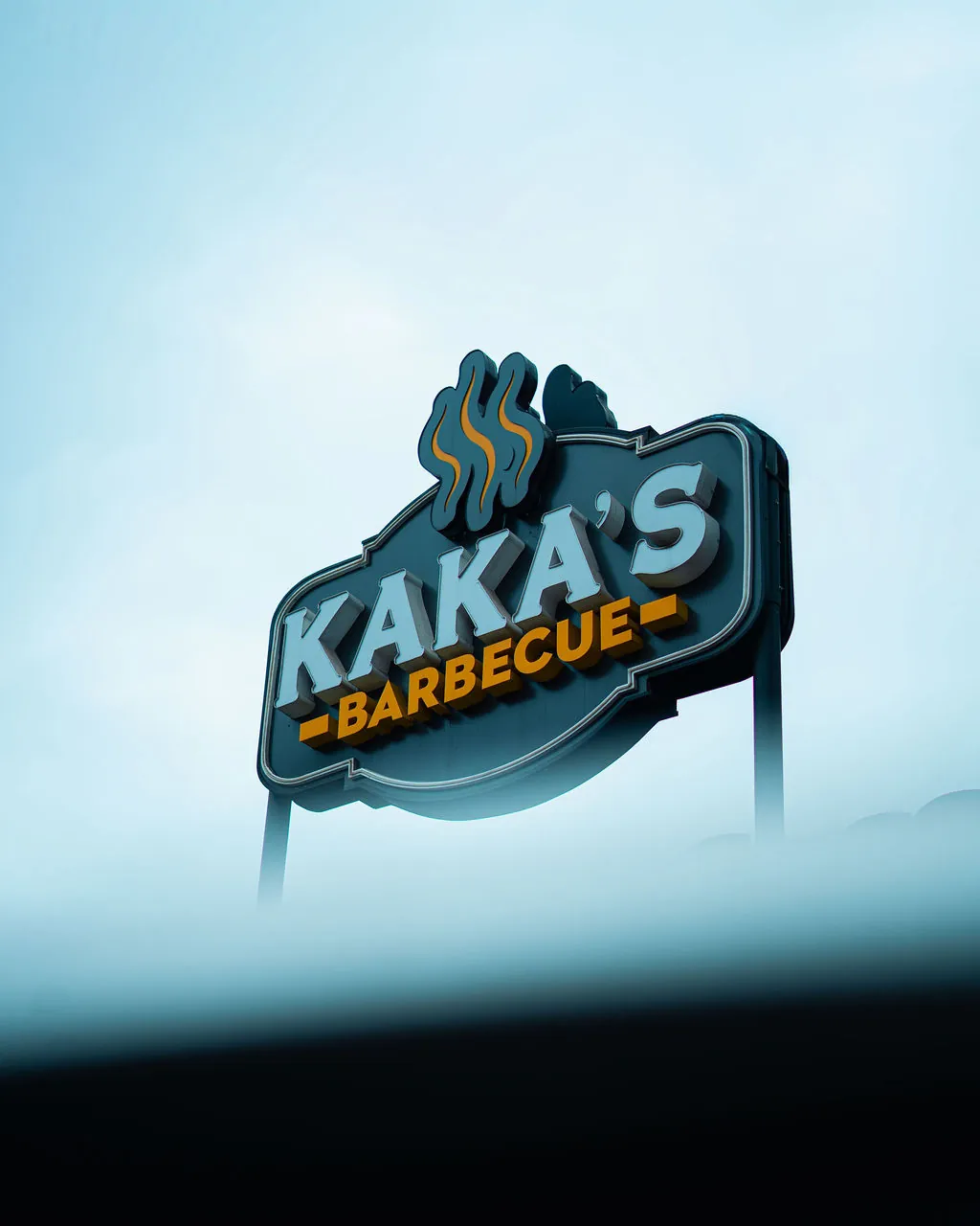 The Kaka's Barbecue sign standing tall against the Arusha sky
